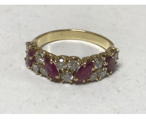 An 18ct gold ruby and diamond ring, size M/N