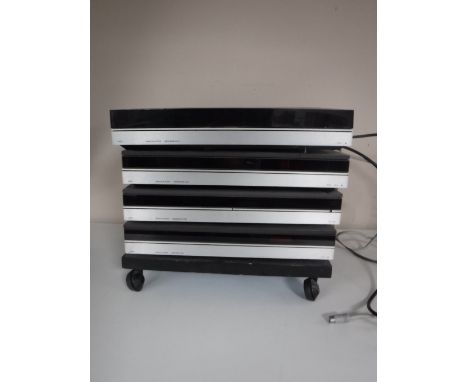 A Bang and Olufsen Beogram 5000 turn table, Beogram 5500 CD player, Beocord 5000 amp and Beomaster 5000 tuner amplifier. COND