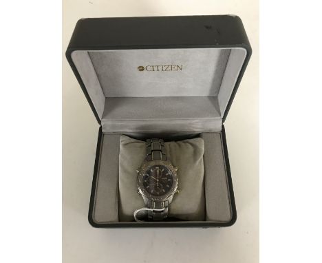 A Citizen gentleman's Titanium Eco-drive wrist watch, boxed, with papers. 