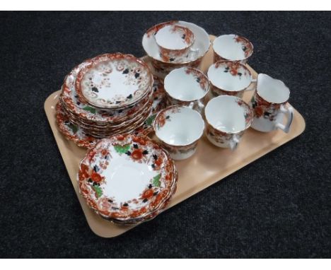 A twenty three piece antique china tea service