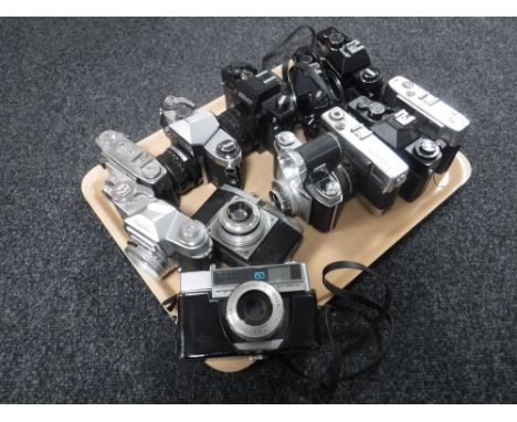 A tray of twelve vintage cameras including Zenti, Praktica etc 