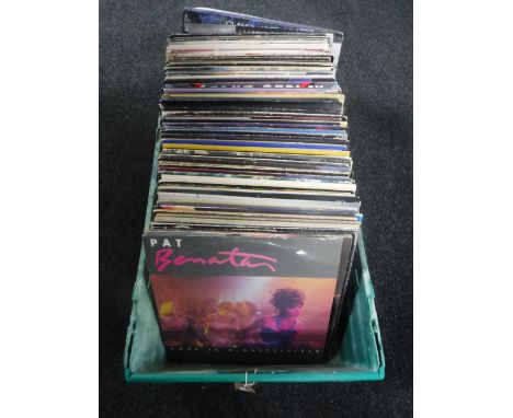 A crate containing a large quantity of 12" vinyl L.P. records - Kiss, Jimi Hendrix, T Rex, Queen, Bob Dylan, Hawkwind, U2, Ro