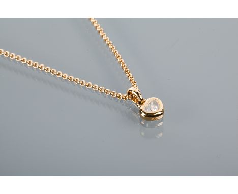 DIAMOND SET CHOPARD PENDANT NECKLACE 
the heart shaped pendant housing a loose brilliant cut diamond, in eighteen carat gold 