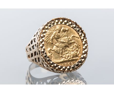 HALF SOVEREIGN RING
dated 1902, mounted in a nine carat gold ring, size O