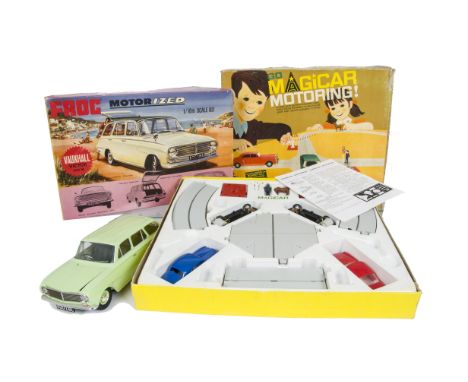 A Tri-ang Frog 1/16 Motorized Vauxhall Victor Estate Kit, pale green plastic body, dark green interior, completed to a good s