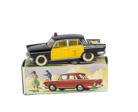 A Rico (Spain) Plastic Seat 1400c Taxi Barcelona No.727, black/yellow body, friction drive motor, tinplate base, red roof lig