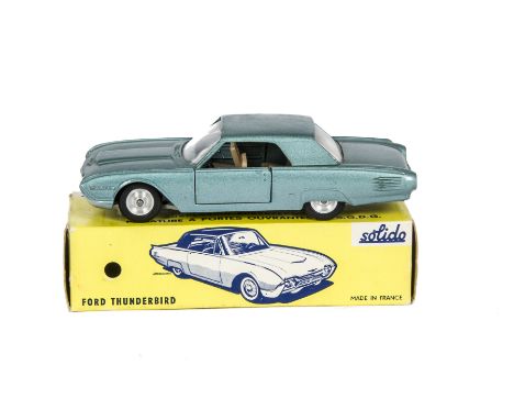 A Solido 128 Ford Thunderbird, light metallic blue body, tan interior, silver trim, cast spun hubs, in original box, E, box F