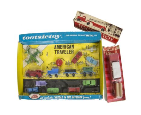 Tootsietoy American Traveller Set No.1740, fourteen piece set, Aerial Hook & Ladder No.489, Ford Station Wagon & Trailer, in 