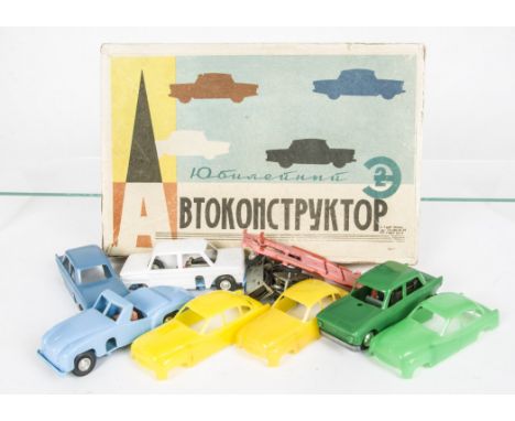 USSR Solido Style Vehicle Constructor Set, comprising five vehicles, each with removable baseplate, wheels, clockwork motor a