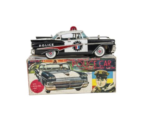 A Yonezawa (Y) Tinplate Battery-Operated Highway Patrol Police Car, Ford Fairlane with white/black body, detailed tinprinted 