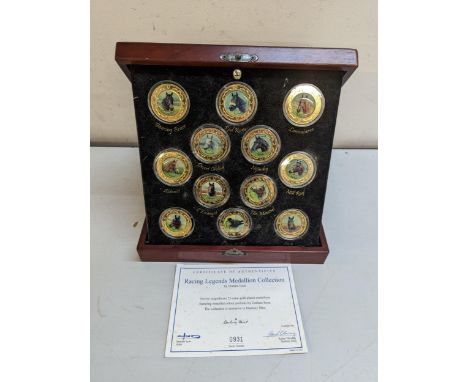 A cased set of Danbury Mint, Graham Isom racing legends medallion collection (12)Location: A1F 