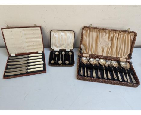 A cased cutlery set to include six silver coffee bean spoons, silver plated spoon and fork set and a set of six stainless ste