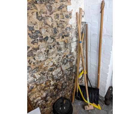 Garden hand-tools to include a snow shovel, hoes, a rack, a saw and a cast iron cooking pot together with a Jiffy upright clo