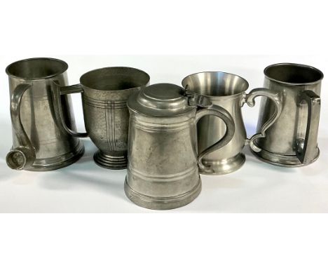 An Arts and Crafts pewter mug, Period Pewter, monogrammed, pattern number 923, 12cm; a reproduction pewter tankard and cover;