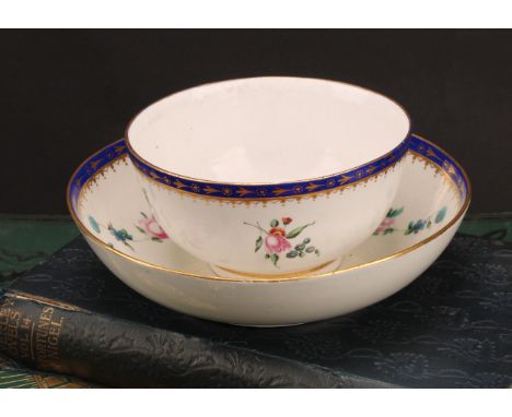 A rare Chelsea Derby breakfast bowl and saucer, painted by Edward Withers, with scattered floral sprigs and swags, under a Sm