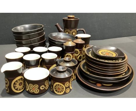 A Denby Arabesque pattern dinner and coffee service, including tall coffee pot, coffee mugs and saucers, oval plate, side pla