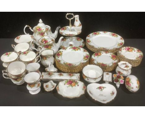 A Royal Albert Old Country Roses dinner and tea service, including large teapot, small teapot, tiered cake stand, six dinner 