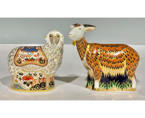 A Royal Crown Derby paperweight, Nanny Goat, Visitors Centre exclusive, gold stopper, printed mark in red; another, Imari Ewe