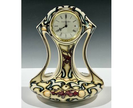 Moorcroft Black Ryden clock, Time Flight pattern, limited edition 47/100, signed K. Goodman, 25cm high.