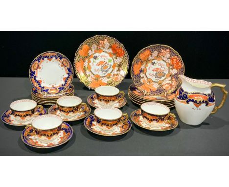 A Royal Crown Derby Imari 'Peony' pattern composed set of six shaped circular side plates, 18cm diameter, various dates, earl