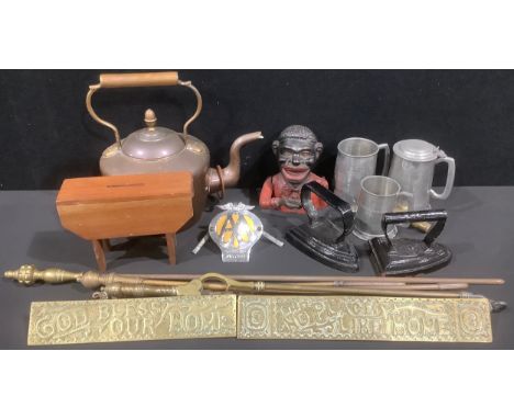 A Victorian copper kettle, acorn finial; a Jolly money bank; an AA car badge; a copper bull ring; an apprentice piece mahogan