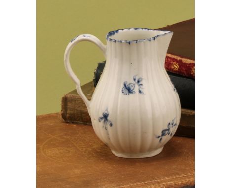 A Worcester Gilliflower pattern fluted sparrow beak jug, decorated in underglaze blue, 10.5cm high, crescent mark, c.1770