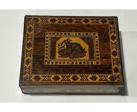 A Victorian Tunbridge ware box and cover, inlaid depicting a rabbit in nature, accompanied by a geometrical border consisting