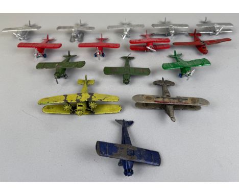 A die-cast triple engine bi-plane, painted apple green, cast British made;  nine Tootsie toys type UX214 single wing planes, 