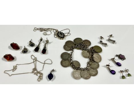 A selection of silver and other jewellery, the silver jewellery includes five pairs of earrings; peridot, amber and a pair of
