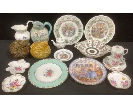 A Royal Doulton Brambly Hedge miniature teapot, 9cm, a miniature "Winter" plate, a pair of plates "Store Stump" and "Summer";
