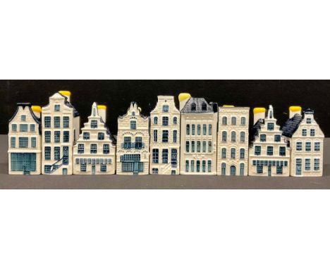 A collection of KLM gin decanters, modelled as Dutch houses, the largest 11cm high (9)
