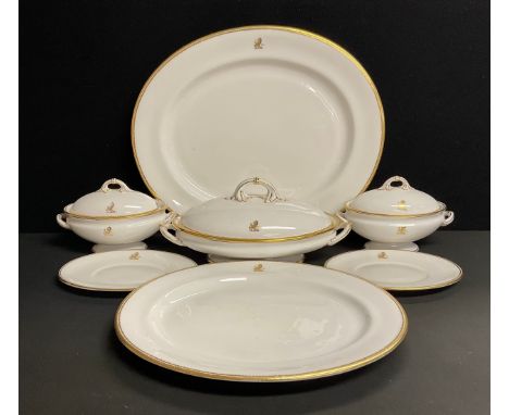 A pair of Royal Worcester sauce tureens, covers and stands, gilt decorated, bearing crest, date code for 1915, retailers F. C