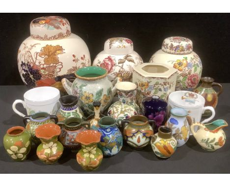 A Mason's Harvest Gold pattern ovoid ginger jar and cover, 22cm; other similar Mason's ginger jars and a vase; a miniature Go