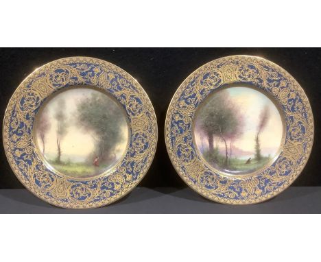 A pair of Royal Worcester cabinet plates, painted by G.H. Evans, each with a figure in a landscape, retailed by Ovington Brot