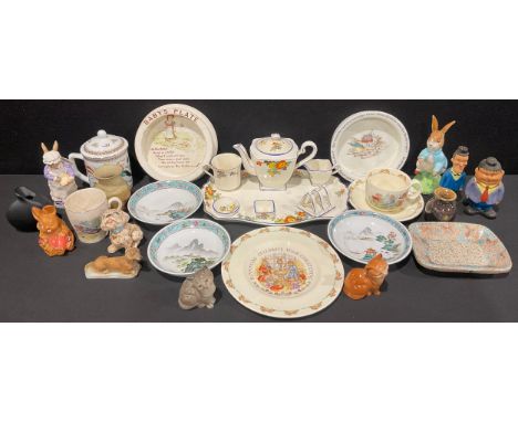 A Beswick Beatrix Potter model, Mrs Rabbit Baking, 14.5cm, boxed; another, Peter Rabbit, 17cm; a Royal Doulton Bunnykins baby