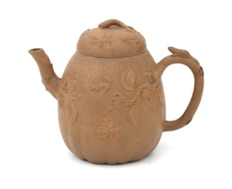 A Chinese Yixing teapot with relief decorations of blossom branches, butterflies and squirrels, early part of 20th century (m