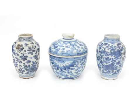  Two blue-white Chinese porcelain vases with whryten-moulded relief and floral decor, Kangxi-period, comes together with a bl