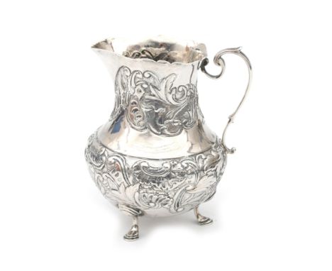  A Dutch silver milkjug. Indistinct marks, possibly Haarlem. Maker's mark a harp, possibly David de Klerk. Year letter (G) 17