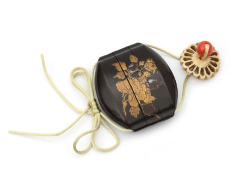  A two compartment lacquer inro, decorated in gold makie and mother of pearl. With a pierced bone netsuke probably of later d
