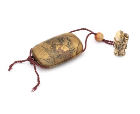  A Japanese lacquer four compartment inro, decorated in gold, silver and iroe hiramakie with a three clawed dragon above a tu