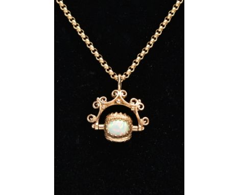 A YELLOW METAL SWIVEL FOB PENDANT AND CHAIN, the swivel fob set with three oval synthetic opal cabochons, fitted within a scr