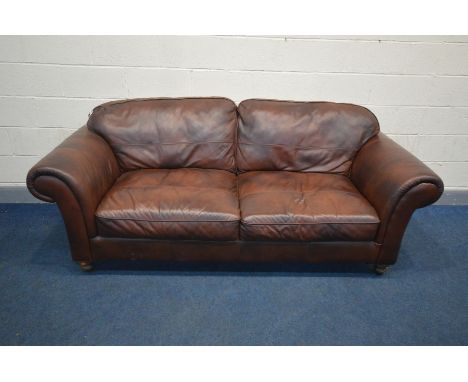 A BROWN LEATHER SOFA, length 227cm