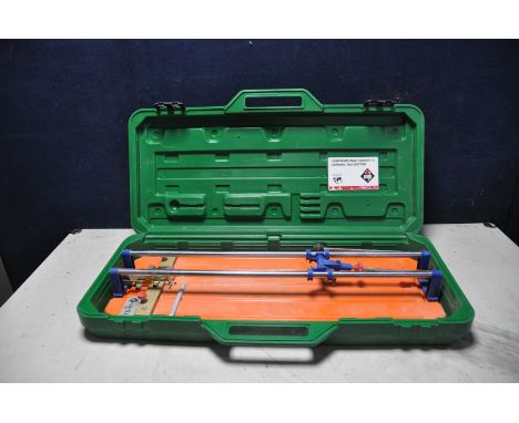 A RUBI TS60 CERAMIC TILE CUTTER in case