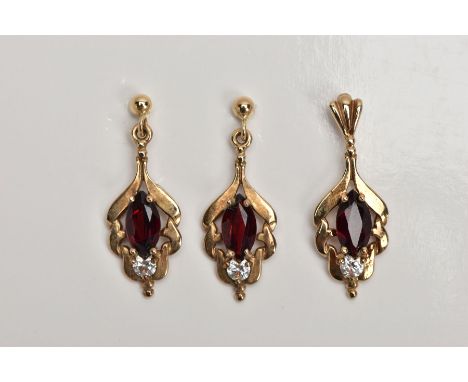 A PAIR OF 9CT GOLD GARNET AND CUBIC ZIRCONIA DROP EARRINGS WITH A MATCHING PENDANT, each earring set with a central oval cut 