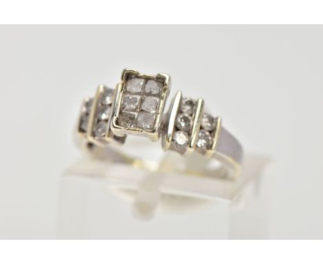 A 9CT GOLD DIAMOND RING, the ring head of a rectangular form, set with six princess cut diamonds, flanked with round brillian