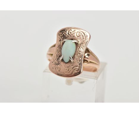 AN EARLY 20TH CENTURY 9CT GOLD OPAL RING, the ring head of a rounded rectangular shape decorated with an engraved foliate des