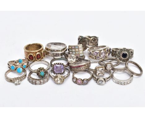 A BAG OF ASSORTED WHITE METAL RINGS, twenty-one rings, some set with paste or semi-precious stones, some with marks to indica