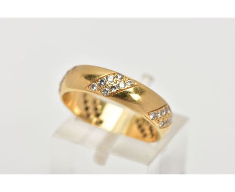 AN 18CT GOLD, DIAMOND WEDDING BAND, designed with five asymmetrical sections, each set with six small, round brilliant cut di