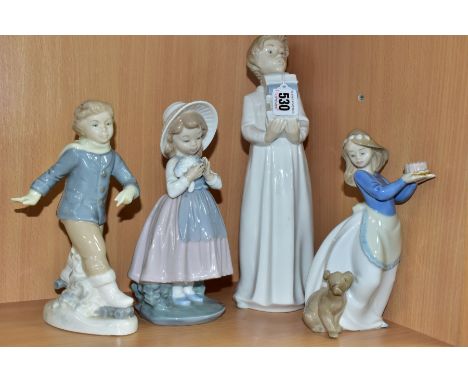 THREE NAO FIGURES OF CHILDREN AND ANOTHER SPANISH PORCELAIN FIGURE, comprising boy in a nightdress holding a stack of books, 