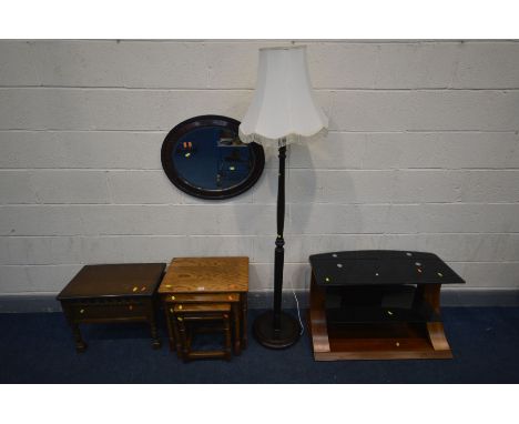 A QUANTITY OCCASIONAL FURNITURE, to include an oak nest of three tables, a walnut effect and glass tv stand, a standard lamp 